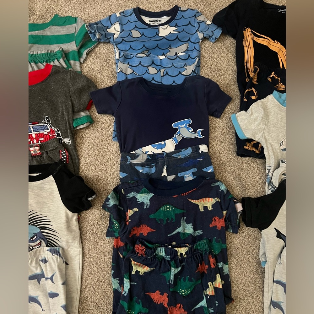 9 sets of toddler boy PJs. All size 3T. Short sleeve shirts and shorts.